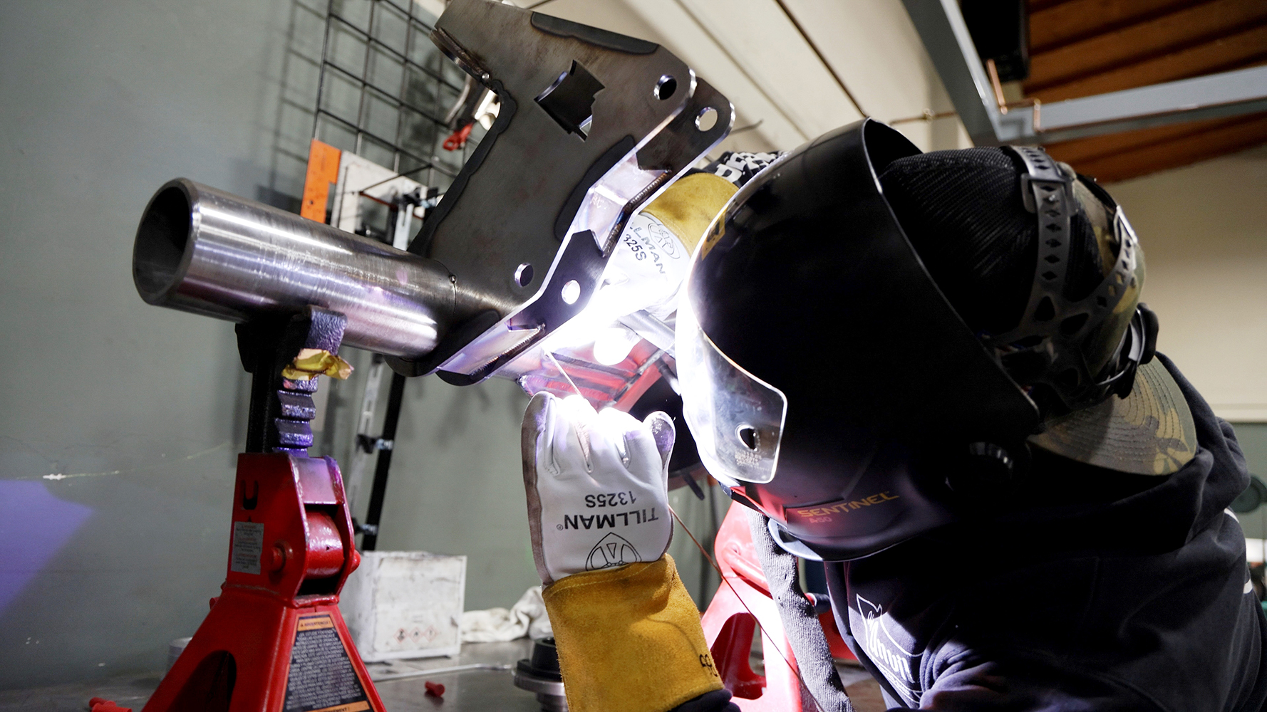 09 TIG welding suspension brackets onto the rear axle housing for a classic truck build