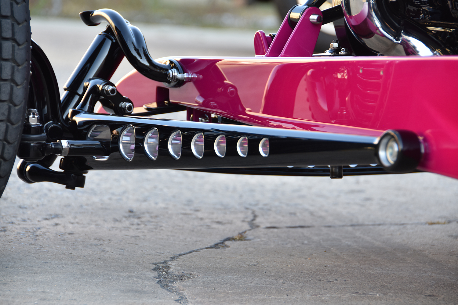 09Close up of the drilled I beam front suspension with hairpin radius rods on the 1932 Ford Roadster chassis