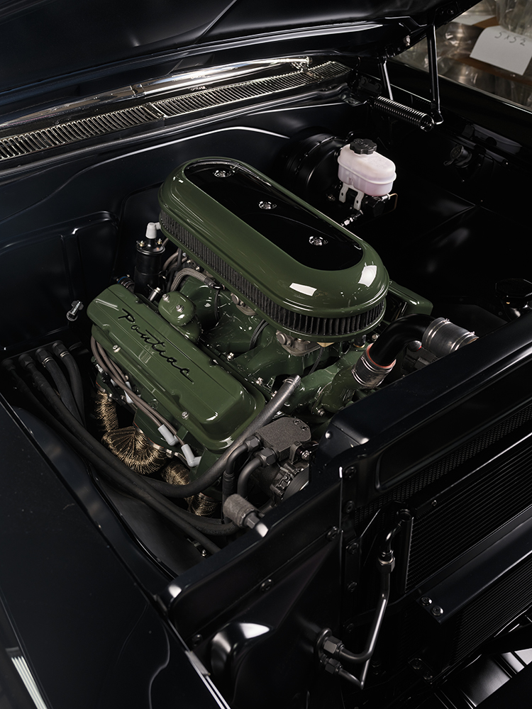 10 1957 Pontiac Safari wagon detailed engine Pontiac dual quad carb setup wrapped headers