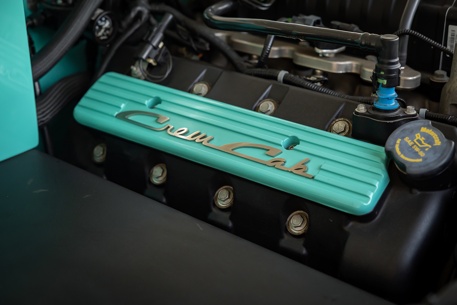 10 1960 Ford F 100 close up of custom valve covers with “Crew Cab” script