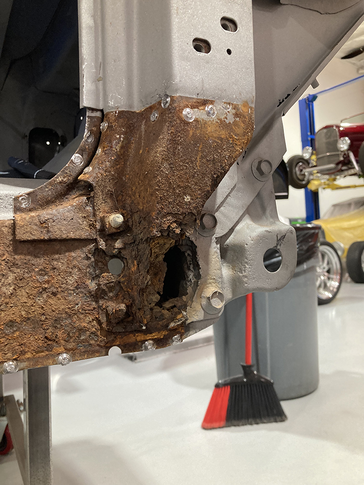 10 Extensive rust damage on the lower A pillar and rocker panel structure