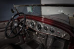 11 1932 Ford Roadster dashboard with a machine turned aluminum panel vintage gauges and a black banjo steering wheel