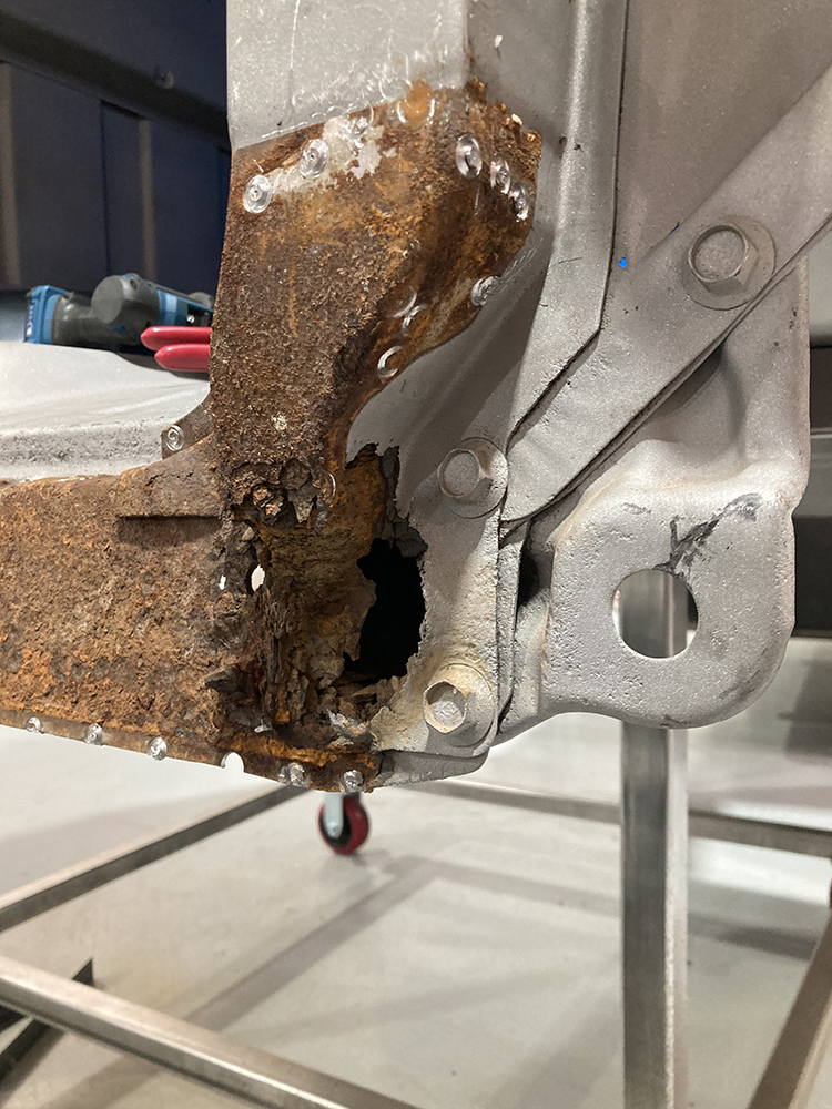 11 Close up of severe corrosion exposing structural weakness in the cab corner