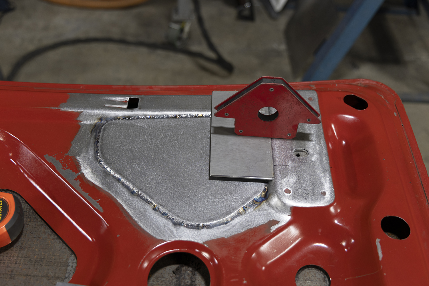 11 Custom metal reinforcement welded onto a 1962 Chevy Impala trunk lid