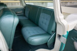 14 1960 Ford F 100 rear seating area with custom teal upholstery and modern stitching
