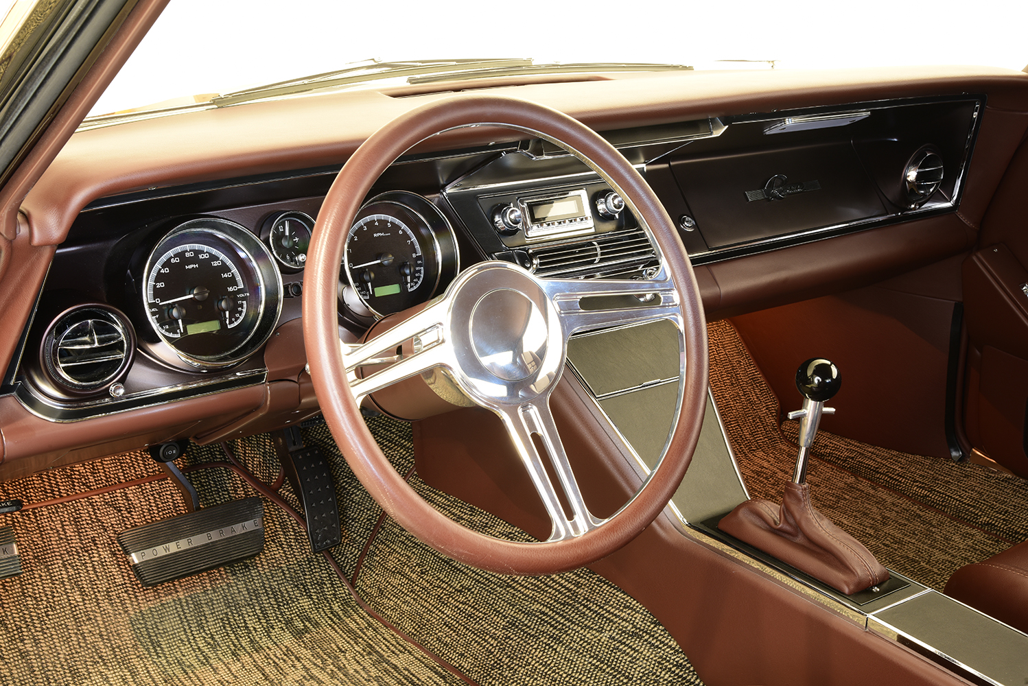 15 1963 Buick Riviera steering wheel and gauge cluster with modernized digital dials and a vintage look