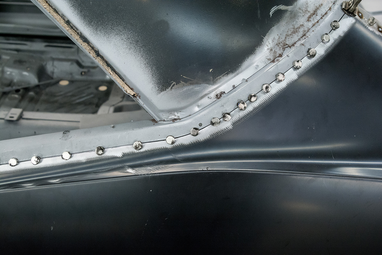 15 Spot welds securing the new quarter panel before full welding