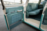 16 1960 Ford F 100 door panel featuring custom upholstery and chrome handle accents