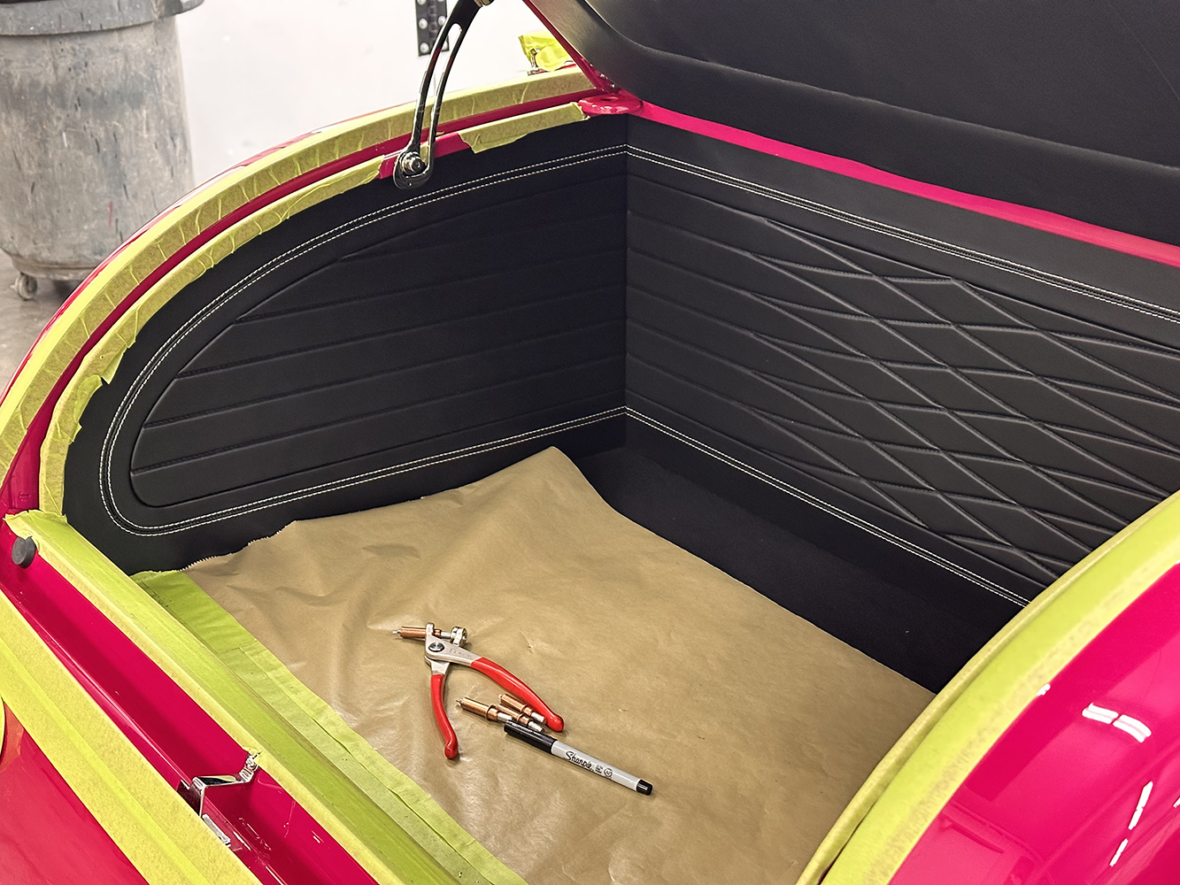 17 Finished custom trunk interior with black upholstery