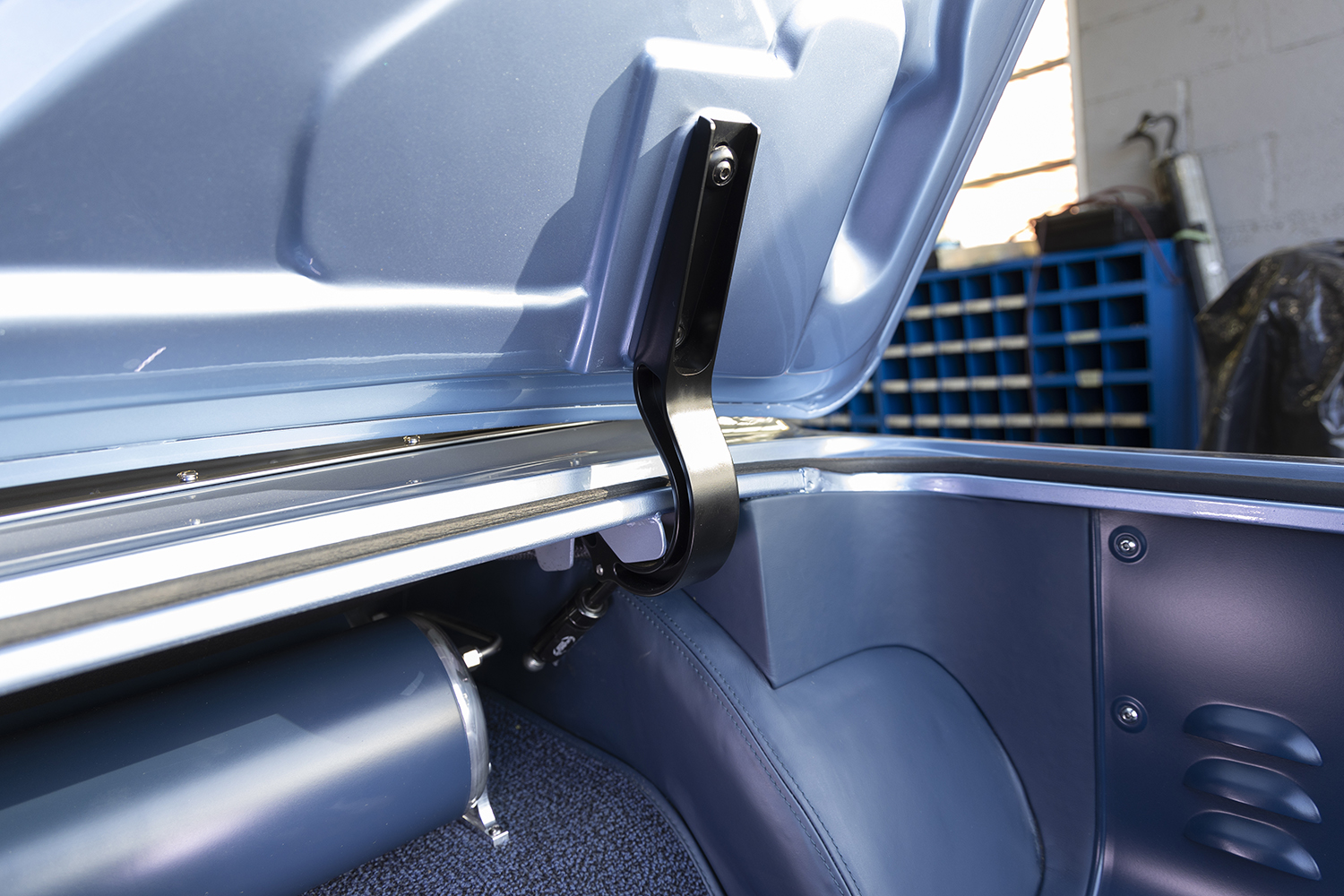 18 Finished billet trunk hinge installed on a restored 1962 Chevy Impala