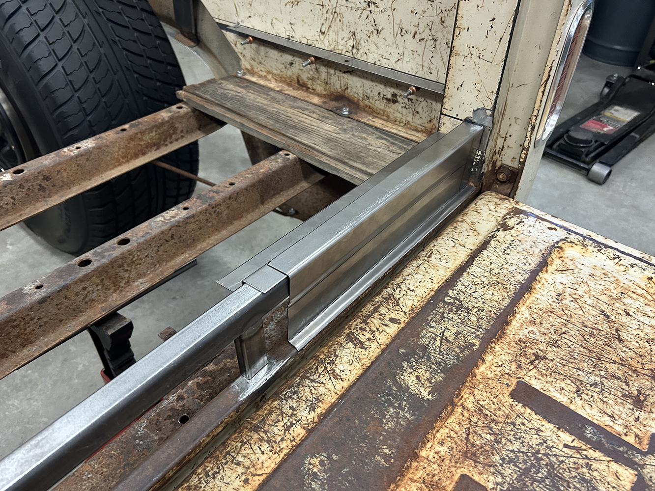 19 Fresh metal support beams welded into the bed structure for reinforcement