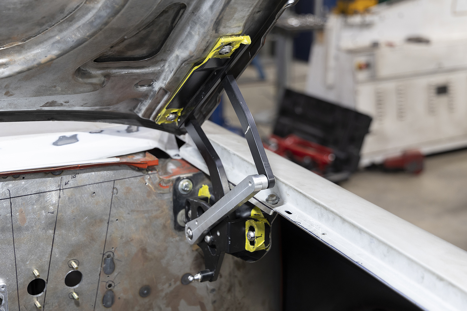 20 Finalized trunk hinge mechanism fitted onto a 1962 Chevy Impala