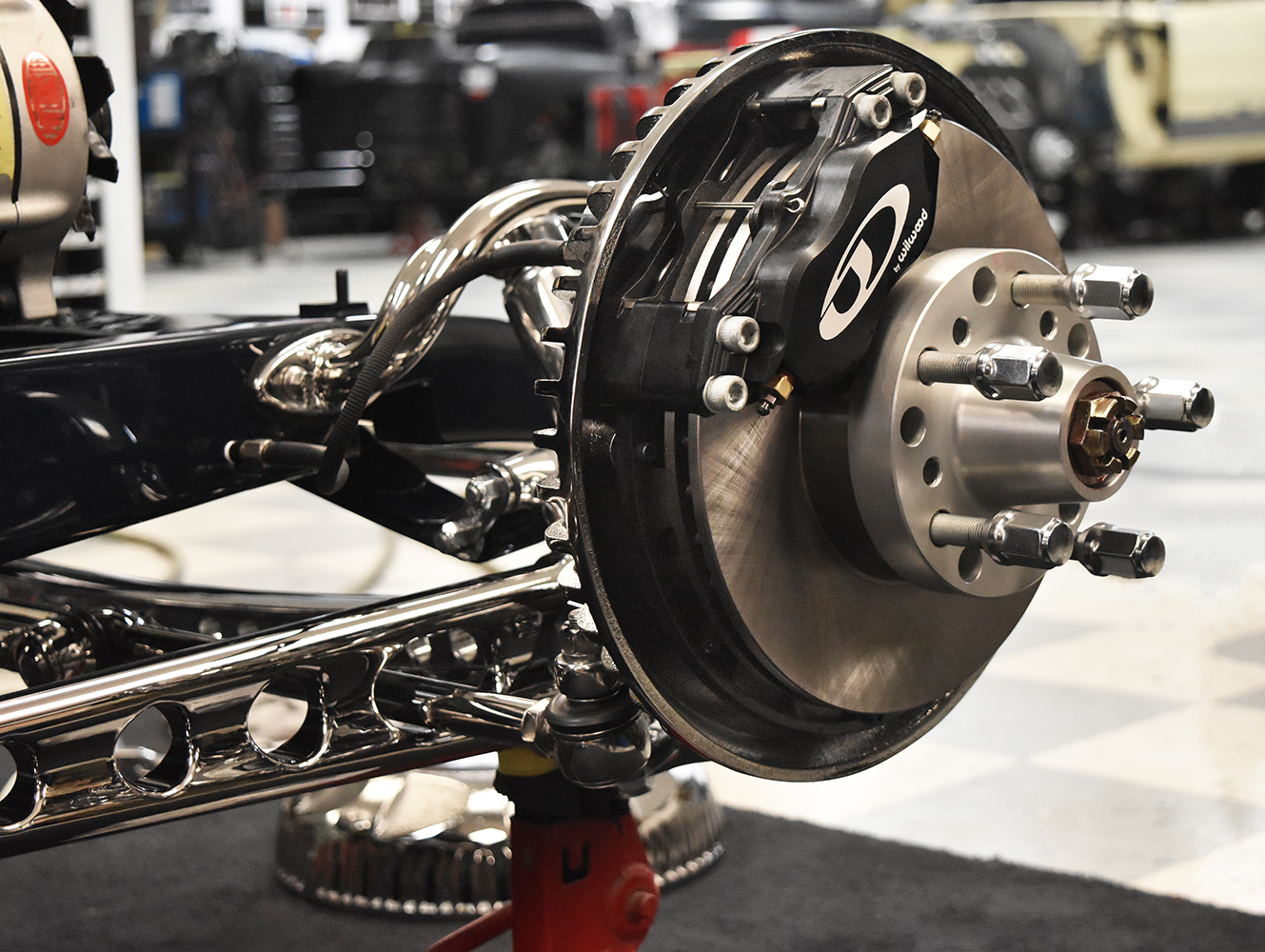 21 Wilwood disc brakes on a polished hot rod suspension