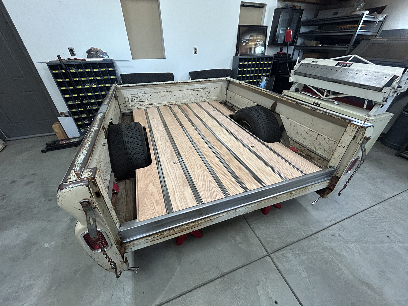 22 The truck bed reassembled with fresh wood planks and polished metal bed strips