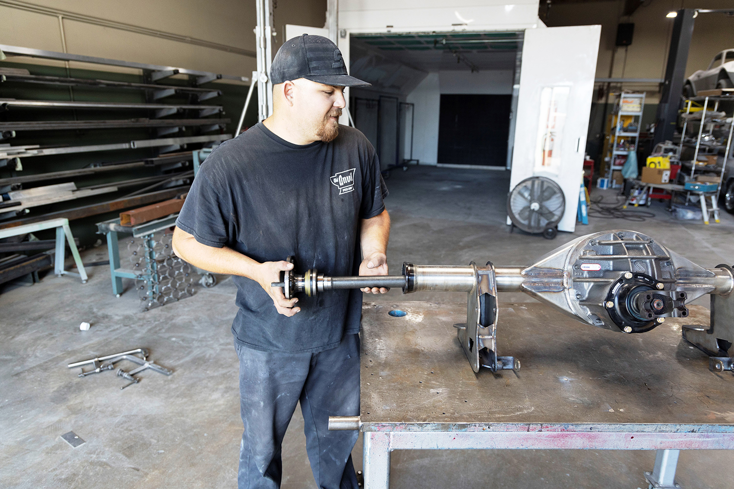 25 Sliding axle shafts into a fabricated Ford 9 inch rear end during final assembly