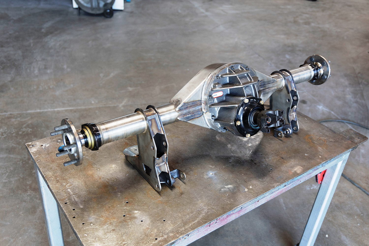 26 Completed custom built Ford 9 inch rear axle with suspension brackets and fresh welds
