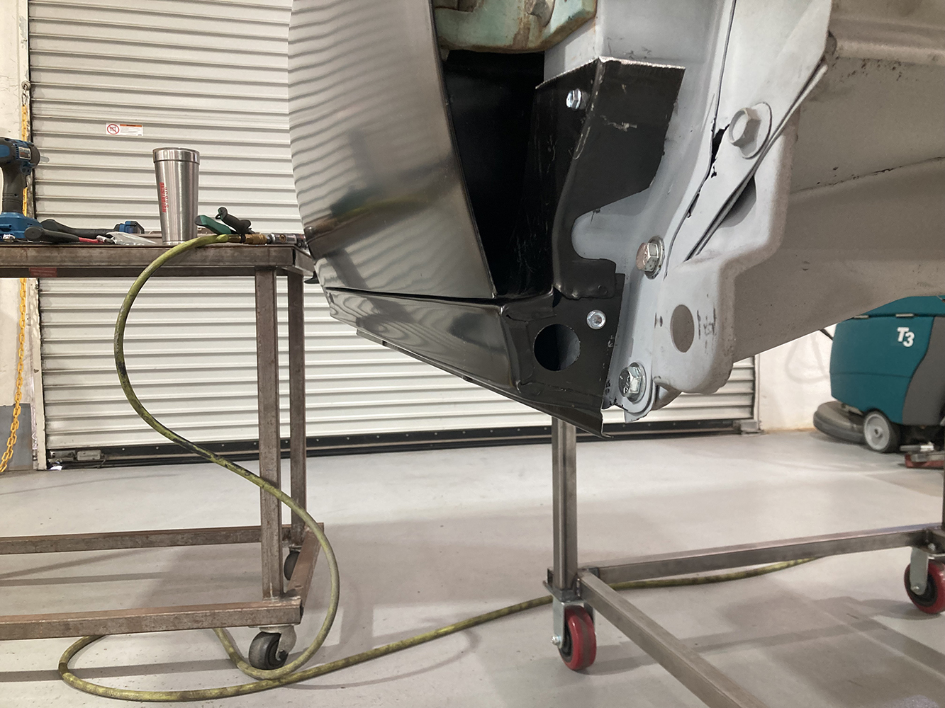 27 Lower cab corner and rocker panel fully aligned and fastened