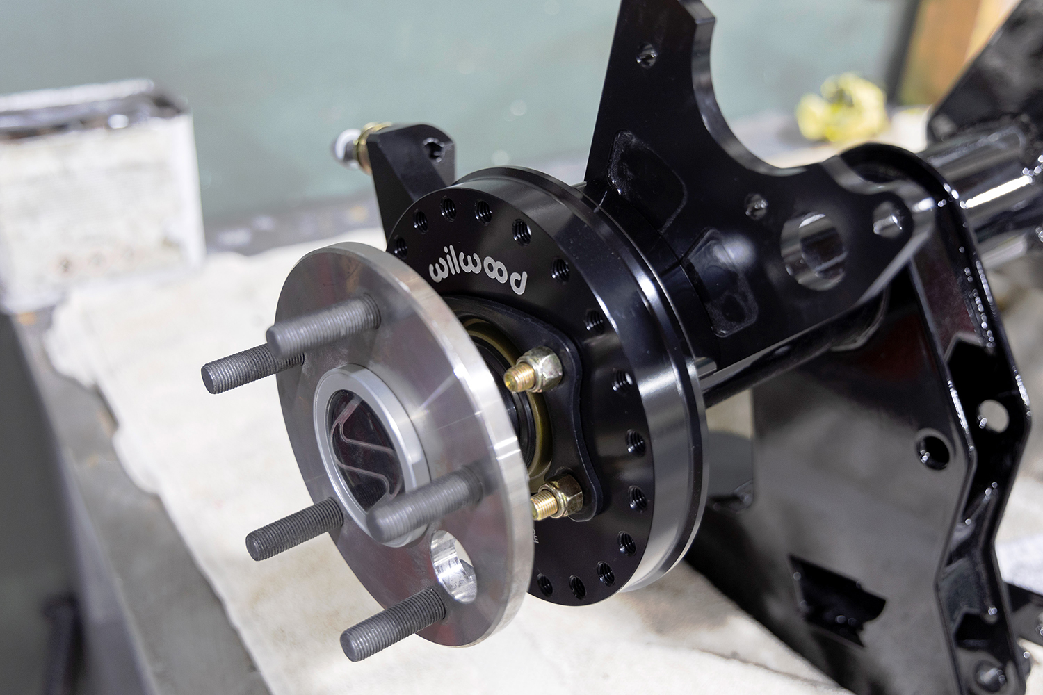 28 Close up of a Wilwood rear brake rotor and hub mounted on a high performance axle