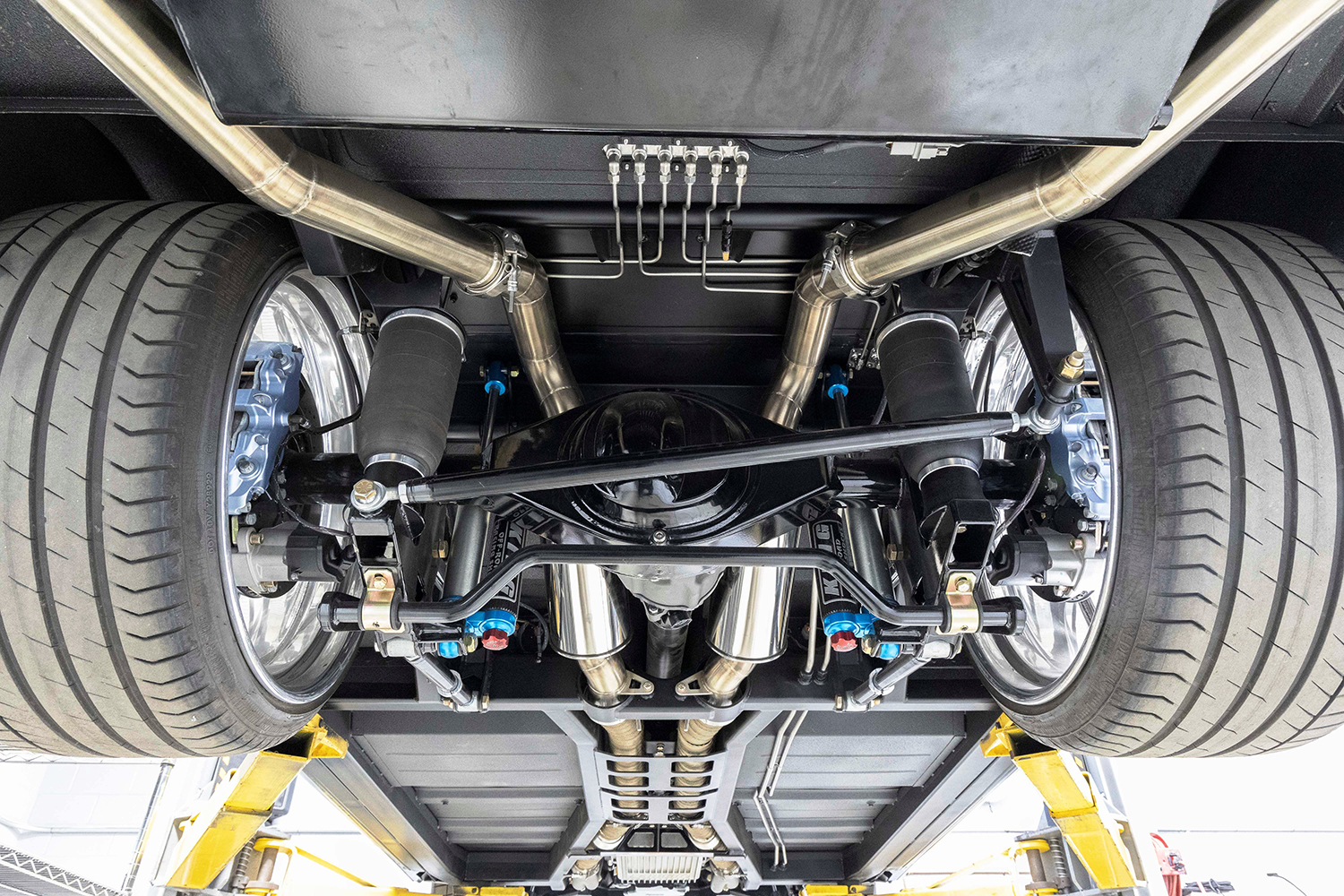 30 Underneath a fully built high performance chassis with a four link suspension and air ride system