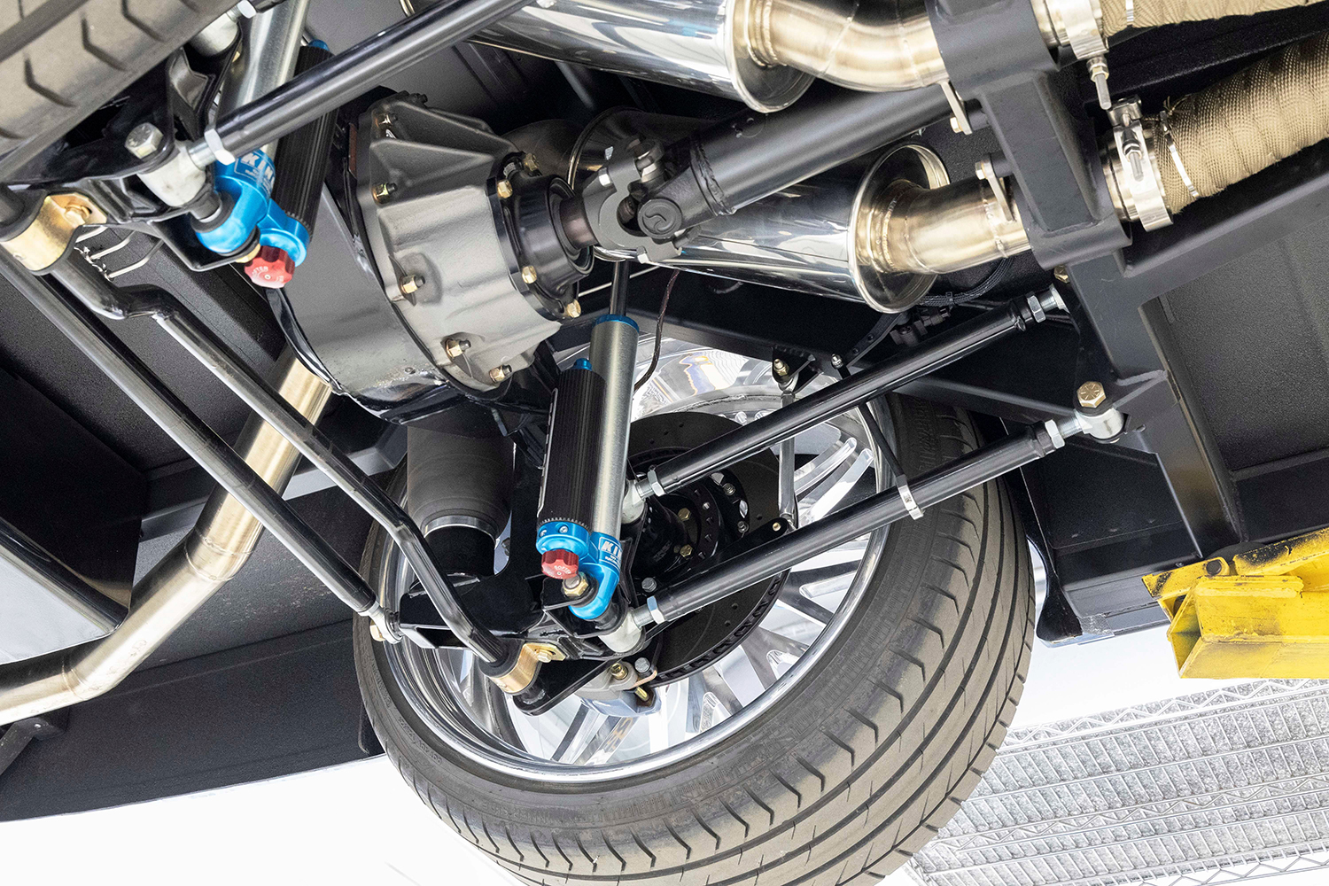 31 High performance four link rear suspension with a Ford 9 inch differential QA1 shocks and stainless steel exhaust system