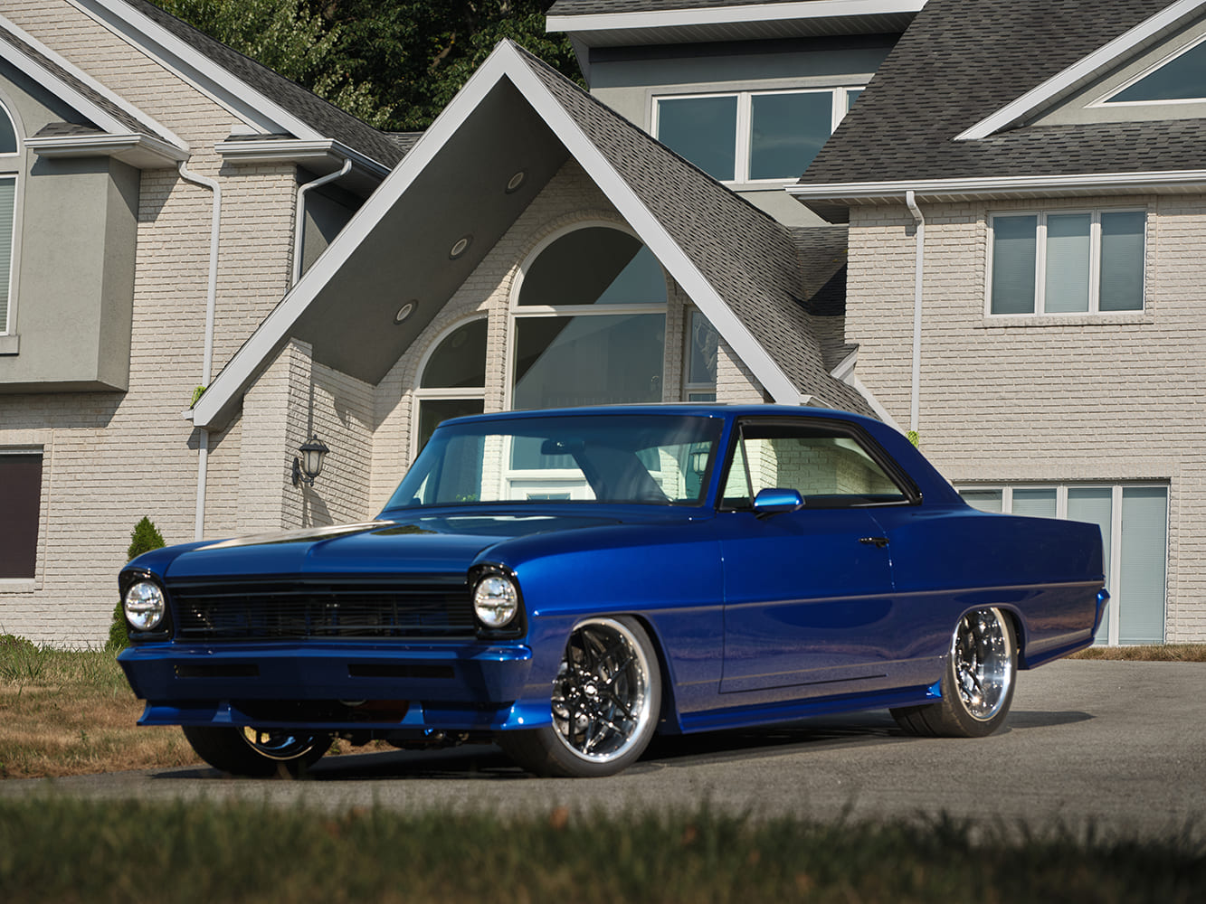 002 1966 Chevrolet Nova with blacked out grille and modern LED headlights