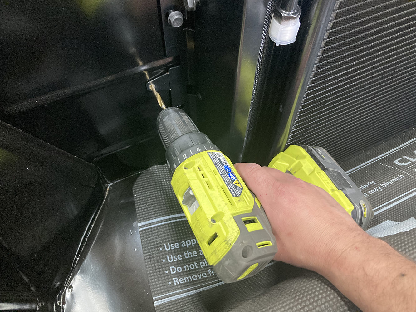004 Drilling mounting holes for the AC condenser brackets
