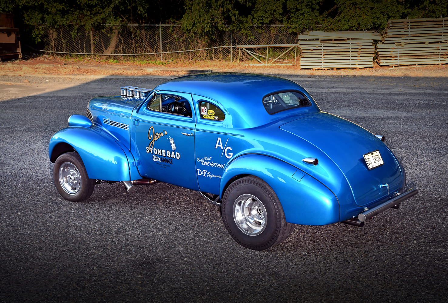 005 1939 Chevy Gasser coupe with vintage lettering and bright blue paint