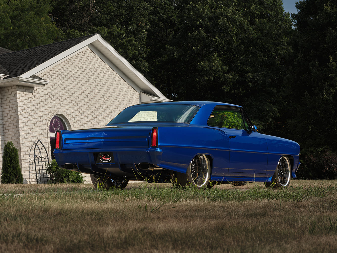 005 1966 Chevy Nova rear view with flush mounted taillights and custom exhaust