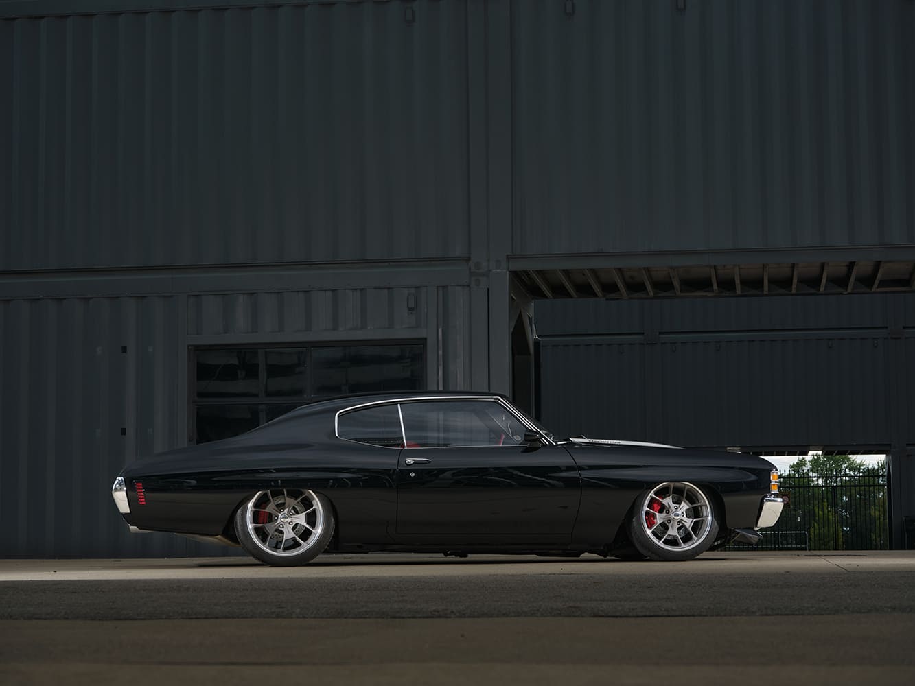 005 1971 Chevrolet Chevelle SS side profile showcasing deep dish wheels and red brake calipers