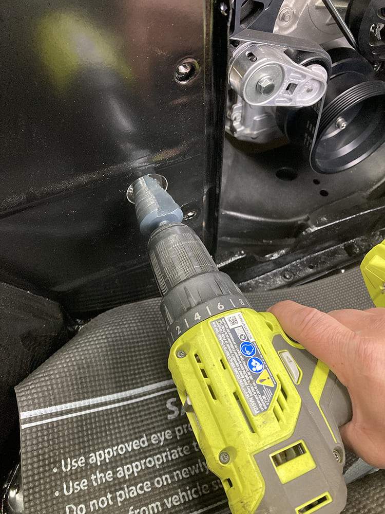 005 Step drill bit used to enlarge firewall hole for AC lines