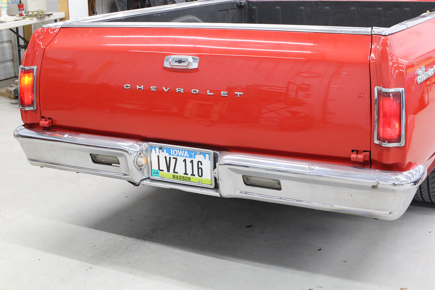 006 1965 Chevrolet El Camino rear taillights illuminated with Iowa license plate