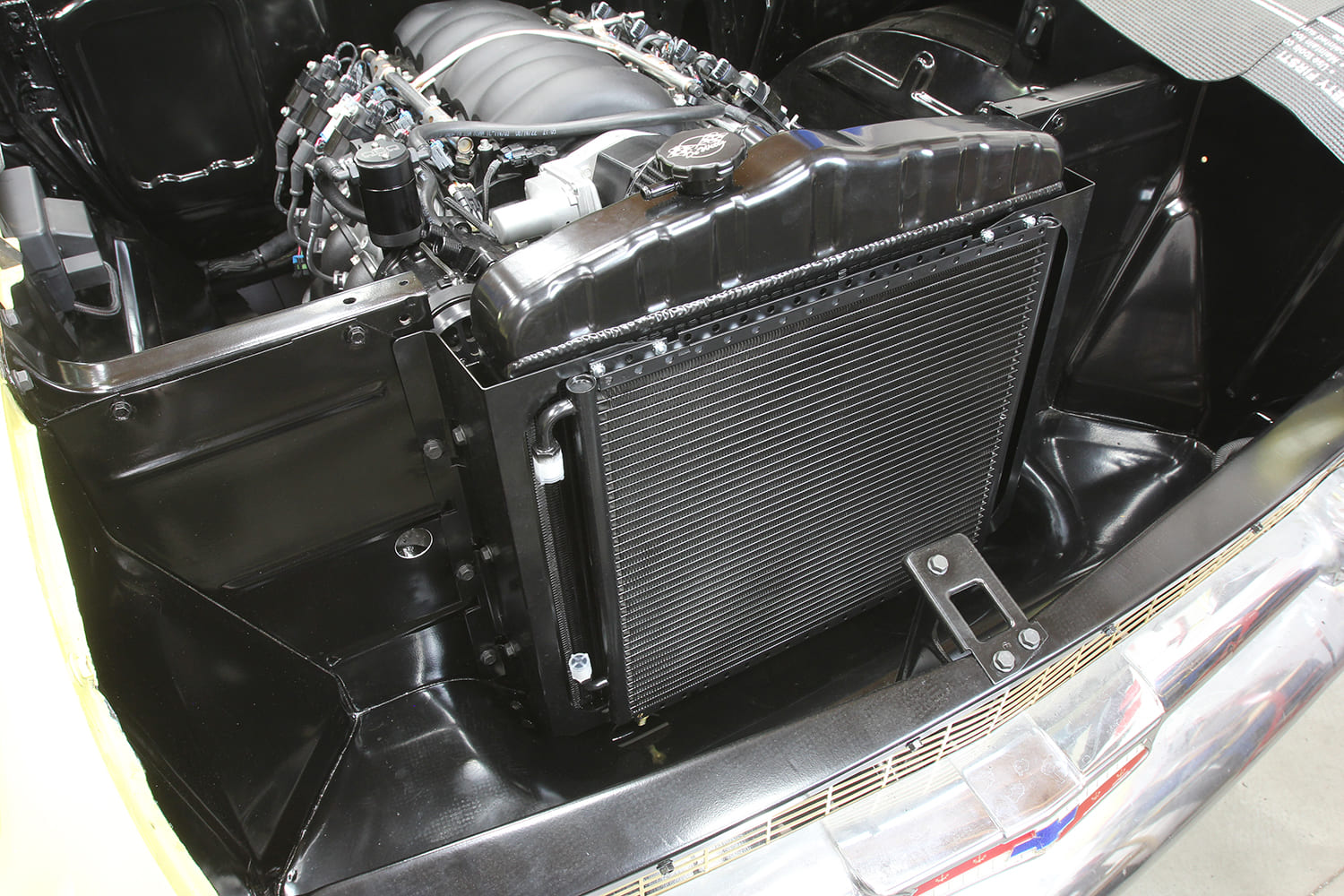 007 AC condenser and radiator installed in the engine bay