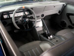 009 1966 Chevy Nova modern interior with a leather wrapped dash and digital gauges