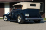 01 1932 Ford Phaeton in dark blue with cream top and steel wheels a classic touring configuration