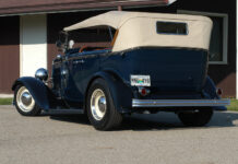 01 1932 Ford Phaeton in dark blue with cream top and steel wheels a classic touring configuration
