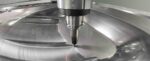 Digital Sheet Forming for the Future 01 A CNC mill precisely cuts a contoured die for shaping classic fender panels