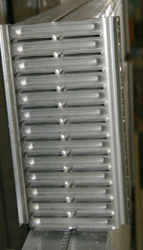 010 Detailed view of extruded aluminum cooling fins in a high performance radiator
