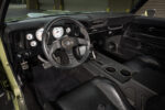 014 1969 Chevrolet Camaro SS interior featuring custom black leather seats and carbon fiber accents