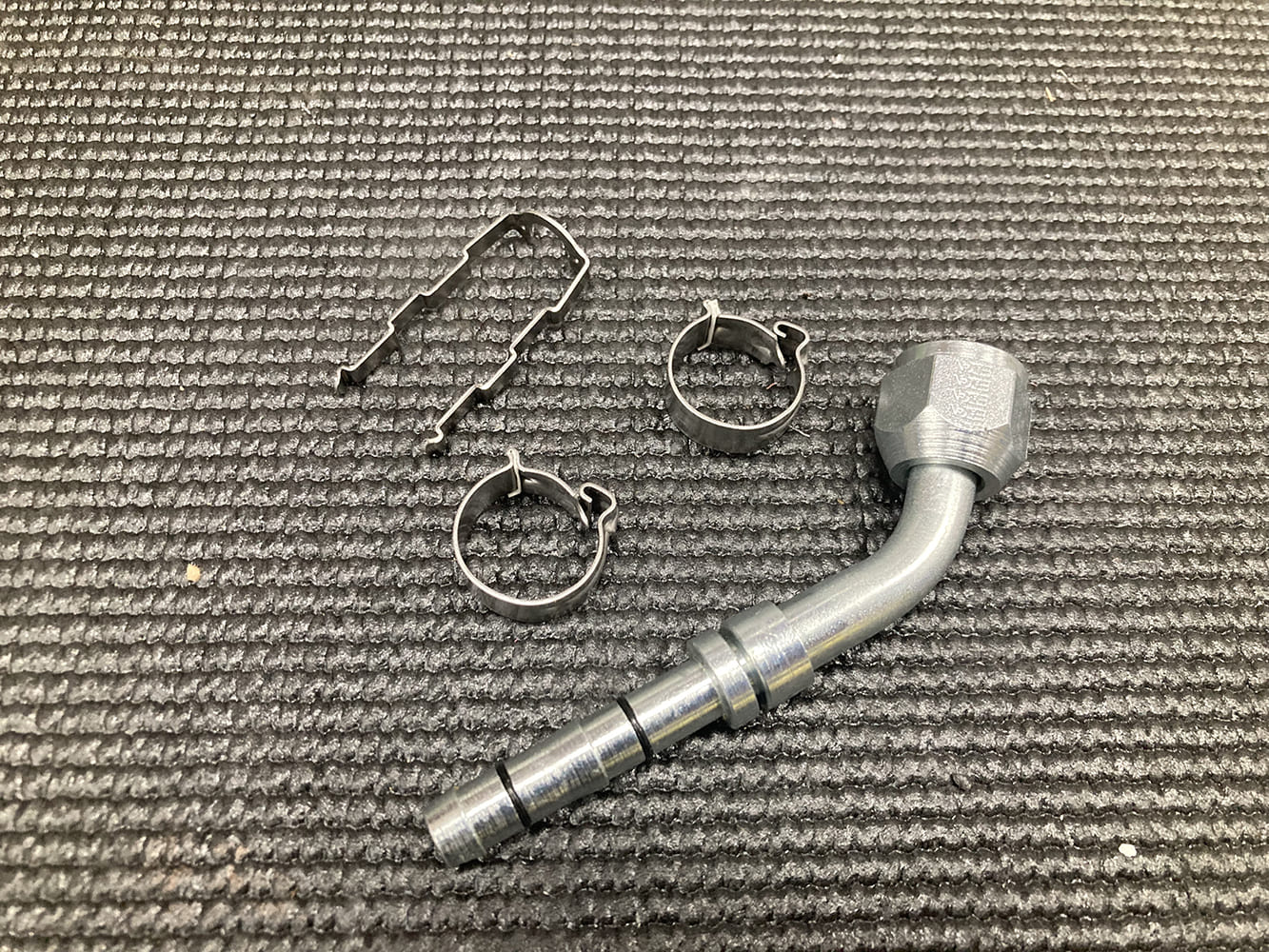 015 AC fitting with clamps and retaining clip