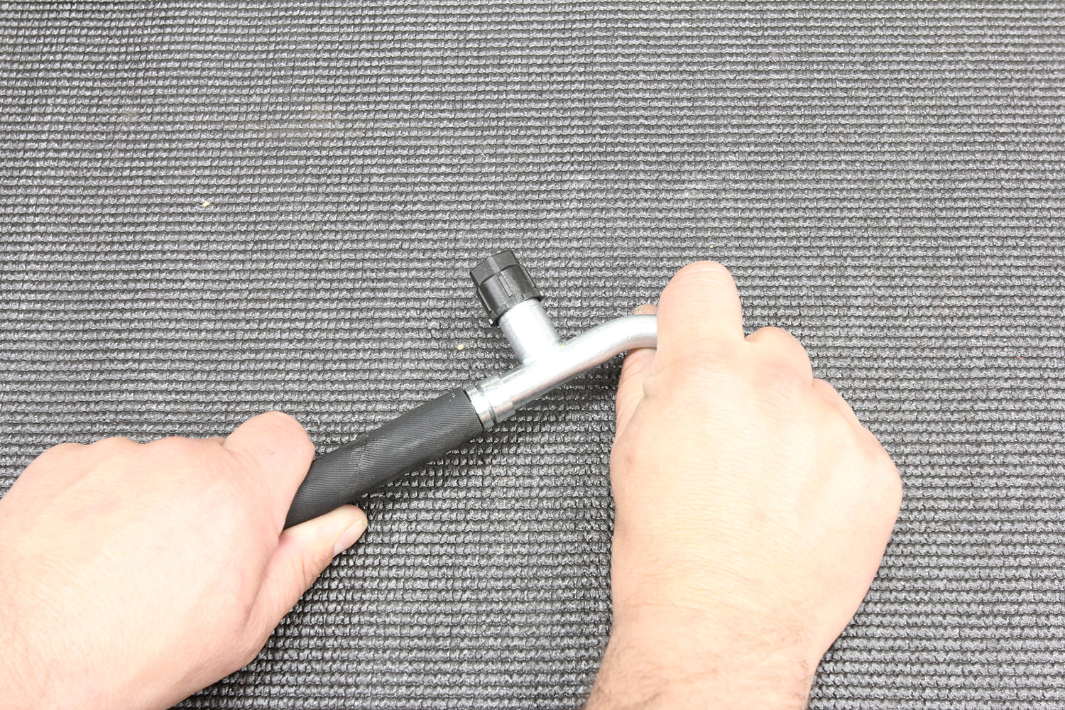 017 Hand fitting a hose onto an AC fitting
