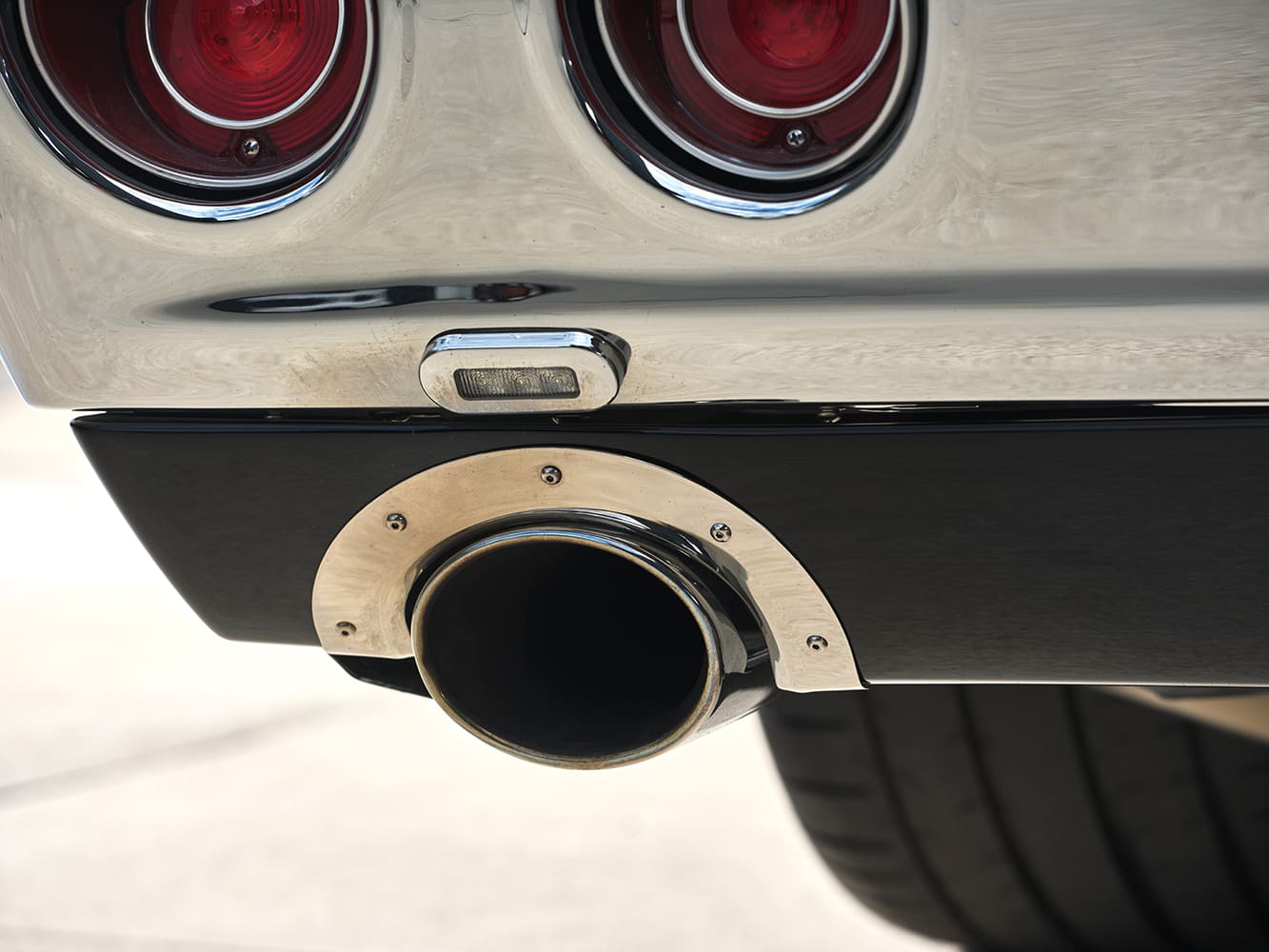 018 1971 Chevy Chevelle SS rear exhaust with a large polished tip and chrome bumper
