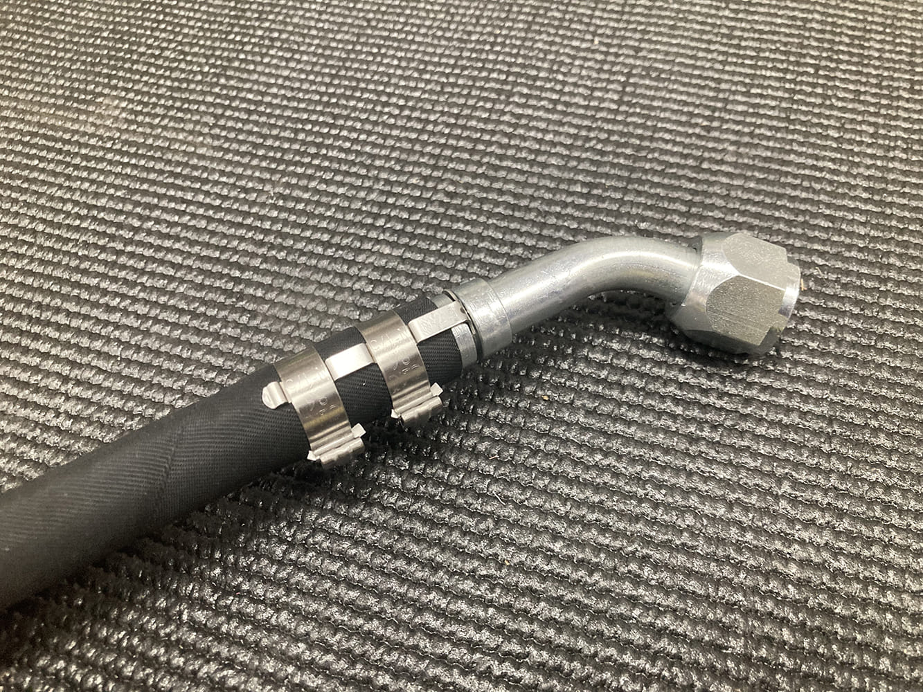 019 Completed AC hose assembly with crimped clamps