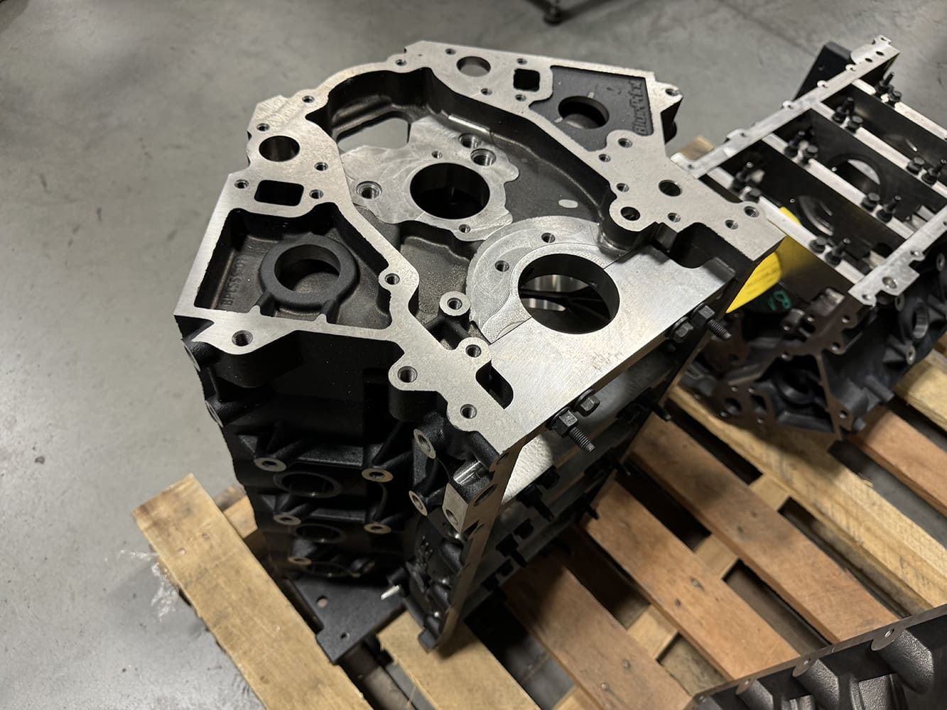 02 Raw LS block front view showing fresh machine work and oil galley passages prepped for final assembly