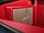 021 1971 Chevrolet Chevelle SS trunk with a custom Marshall speaker integrated into the red leather interior