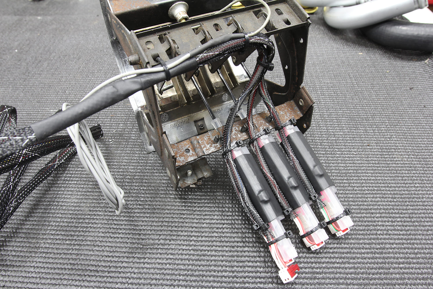 027 Backside of the AC control panel being wired for Vintage Air conversion