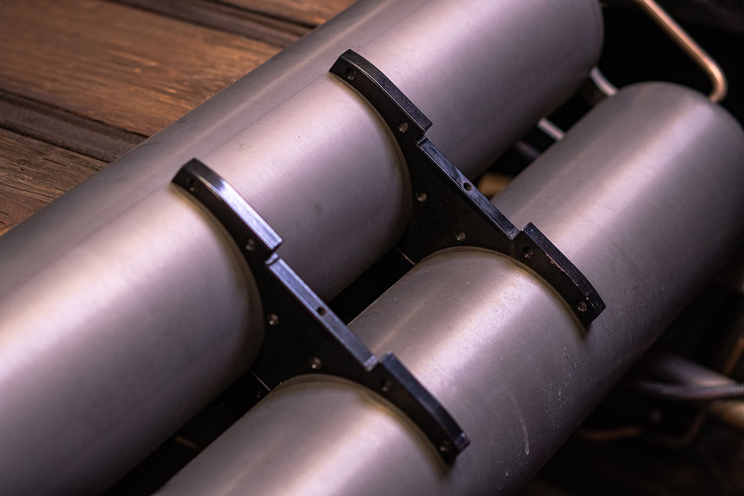 03 Close up of mounting brackets securing dual air tanks to custom wood truck bed