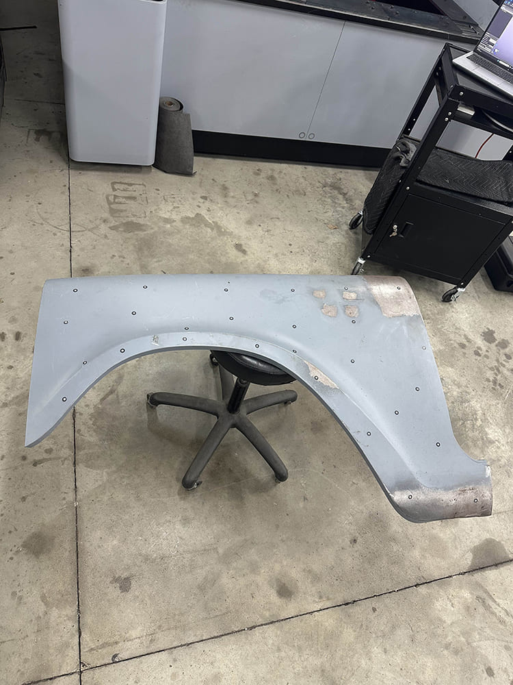 03 Driver side fender panel prepped with reference dots for 3D scanning and CAD modeling