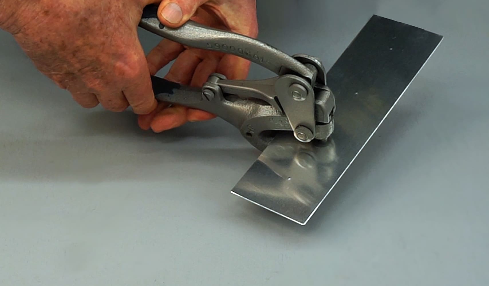 03 Hand operated sheet metal flanger used to create a step in aluminum