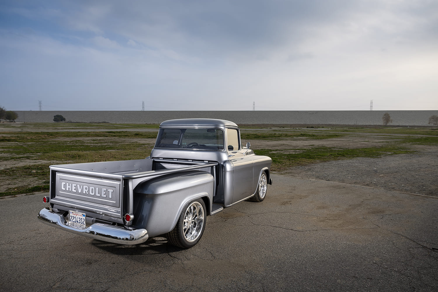 04 1957 Chevy 3100 step side rear view with embossed tailgate and clean chrome bumper