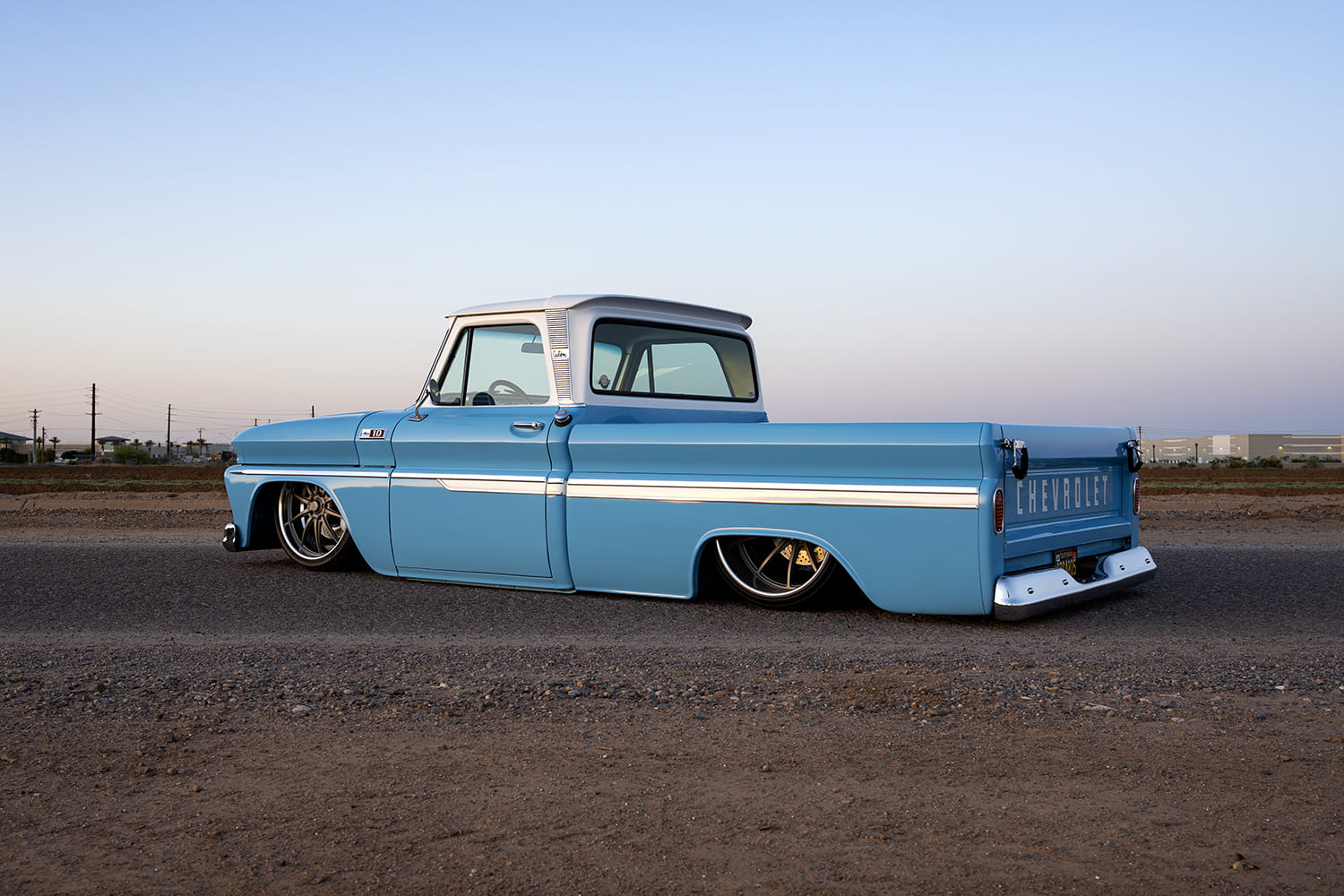 05 1965 C10 short bed pickup rear view chrome bumper and shaved tailgate